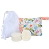 Reusable bamboo makeup remover pads set with mesh laundry bag and zip pouch for sustainable skincare.
