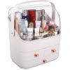 White makeup organizer box with waterproof lid and divided drawers holding cosmetics and skincare