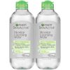 A bottle of Garnier SkinActive Micellar Cleansing Water surrounded by cotton pads, showcasing its gentle yet effective formula for removing makeup and impurities.